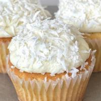 Coconut Cupcake · Larder-made & filled with coconut custard, topped off with coconut cream cheese frosting. 

...