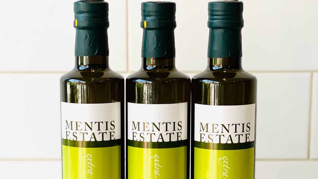 Mentis Estate Extra Virgin Olive Oil · 500 ml bottle | The exquisite olive oil produced by Mentis Estate is hand picked and pressed carefully by local artisans. To preserve the integrity of this extra virgin olive oil, only limited quantities are available. A pure unblended olive oil, with an acidity of less than 0.5%, the Mentis Estate produces an aromatic and fruity nectar. Well-balanced characteristics described as pine, floral, nutty, buttery and pungent with a hint of artichoke make up this extra virgin oil.