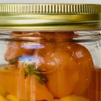 Pickled Specialty Peppers · 1 Jar | Three locally sourced sourced peppers were hand picked by our Executive Chef and pic...