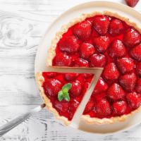 Strawberry Cheesecake · A rich and creamy cheesecake baked with strawberries inside a honey-graham crust.