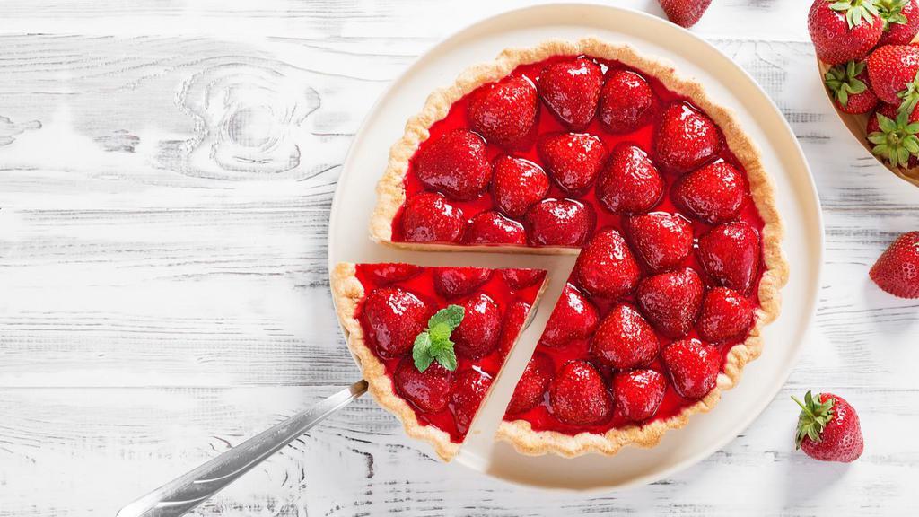 Strawberry Cheesecake · A rich and creamy cheesecake baked with strawberries inside a honey-graham crust.