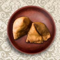 Simply Samosa · A trio of filo pastry stuffed with gently spiced potato mash, peas, and dry spice mix deep-f...