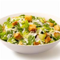 The Caesar Salad · Vegetarian. Crisp romaine hearts, sweet, ripe cherry tomatoes, toasted garlic croutons, shav...