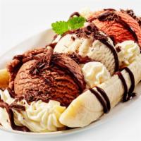 Ice Cream Sundae · Haagen dazs ice cream topped with fresh whipped cream, syrup, and chopped nuts.