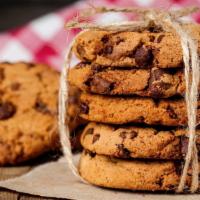 Jumbo Chocolate Chip Cookie · A la mode - vanilla. Fresh baked large cookie loaded with semi-sweet chocolate chips.