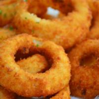 Onion Rings · Crisp, golden onion rings fried perfectly. Available in small or large sizes.