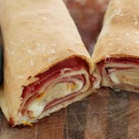 Pepperoni Pizza Roll · Delicious pizza roll stuffed with pepperoni and melted cheese. Served with marinara sauce.