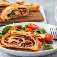 Spinach Pizza Roll · Delicious pizza roll stuffed with fresh spinach and creamy mozzarella cheese. Served with ma...