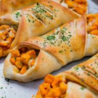 Buffalo Chicken Pizza Roll · Delicious pizza roll stuffed with chicken, bleu cheese, and hot sauce. Served with marinara ...