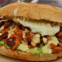 Torta Mexican  Sausage / Chorizo · TOASTED BREAD STUFFED WITH FRIED BEANS, MOZZARELLA CHEESE, MEAT OF YOUR CHOICE, AVOCADO, JAL...