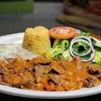 Steak Ranchero Style  / Platillo Bistek Ranchero · ACCOMPANIED BY TWO HANDMADE TORTILLAS AT THE TIME OF YOUR ORDER WITH YELLOW RICE RED BEANS A...