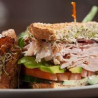 Turkey Club Sandwich · Delicious sandwich, topped with Oven gold turkey, bacon, lettuce, tomato and mayo.