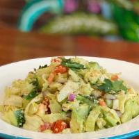 Chopped Salad · Preserved lemon dressing, iceberg, fennel, cucumber, tomato, red onion, avocado, mint, and h...