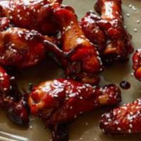 Spicy Honey Wings · Spicy. Seven pieces. Flavorful classic and deep fried bone in wings tossed in spicy honey sa...