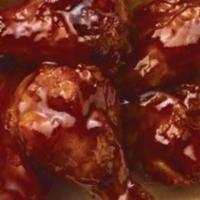 Honey Bbq Wings · Seven pieces. Flavorful classic and deep fried bone in wings tossed in honey BBQ sauce.