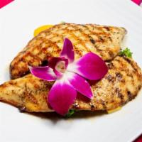 Lemon Chicken Breast · Grilled chicken with lemon sauce served with  steamed vegetables.