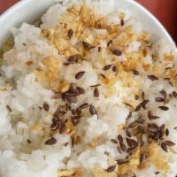 Broken Rice · For moppin’ up that sauce. Topped with fried garlic & toasted flax. “Broken rice” - literall...