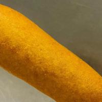 Vegan Corn Dog · Vegan Corn Dog on a stick. Just like when you were a kid only now it's vegan!