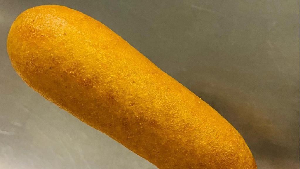 Vegan Corn Dog · Vegan Corn Dog on a stick. Just like when you were a kid only now it's vegan!