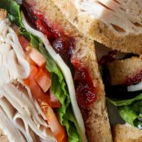Turkey Sandwich · Sliced turkey with mayo, lettuce, tomato, and pickles on your choice of bread.