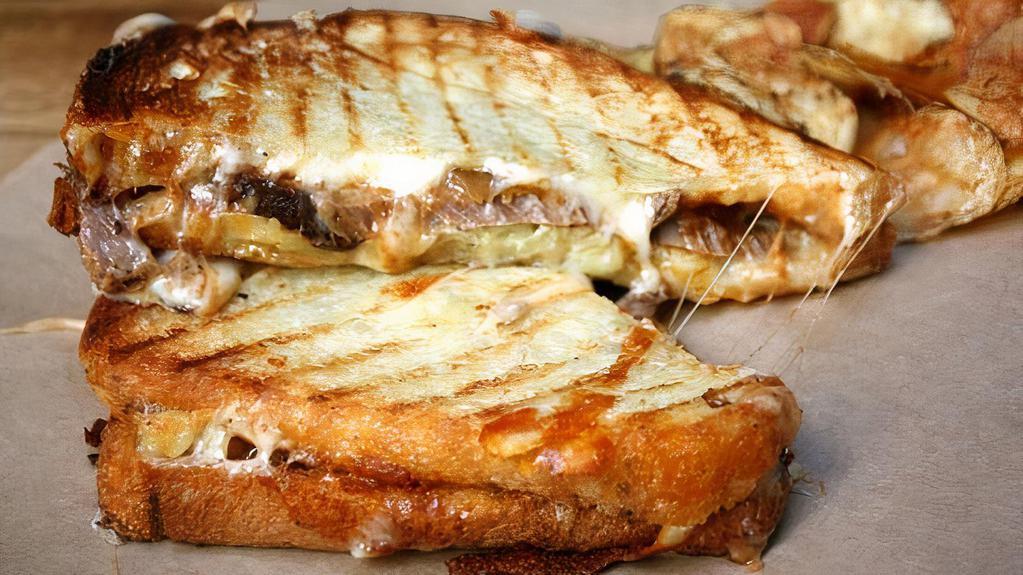 Grilled Cheese · Melted cheddar and american cheese grilled on your choice of bread.