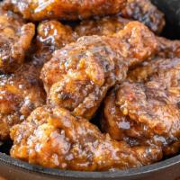 Jerk Bone-In Wings · Served with celery or carrots, and blue cheese or ranch.