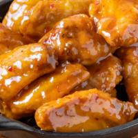 Sweet Chili Bone-In Wings · Served with celery or carrots, and blue cheese or ranch.