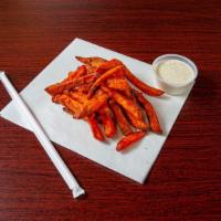 Sweet Potato Fries · Deep orange sweet potatoes.