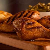 Half Rotisserie Chicken · All natural, marinated and slow-roasted in the premises. Served with green tomatillo sauce o...
