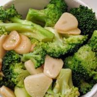 Broccoli (8 Oz) · Sautéed with garlic.