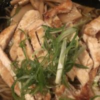 Chicken Ramen · Sliced white meat chicken with soy sauce and vegetable based noodle soup.