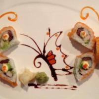 Butterfly Roll · Shrimp tempura, eel, and kani, avocado, wrapped in soy paper, served with eel sauce and spic...