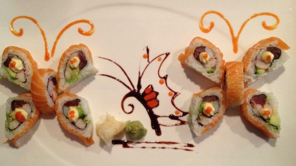 Butterfly Roll · Shrimp tempura, eel, and kani, avocado, wrapped in soy paper, served with eel sauce and spicy mayo.