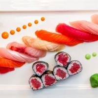 Sushi  Dinner · nine pieces of assorted sushi and one tuna roll Served with soup or salad.