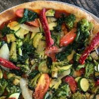 Grilled Vegetable Pizza · Marinated grilled eggplant, tomatoes, zucchini, onions, red peppers, broccoli, spinach and R...