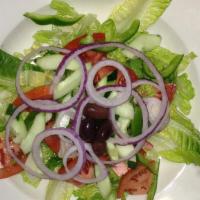 House Salad · Mixed greens, tomatoes, onions, green peppers and cucumbers with your choice of dressing.