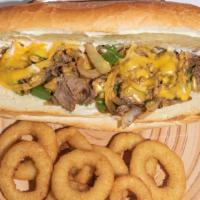 Philly Cheese Steak On A Hero · Steak, with cooked onions and peppers, mayo all in a hero bread.