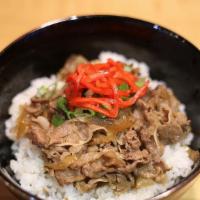 Beef Bowl Don · Our house made simmered thinly sliced beef over a pile of rice. Loaded with onions, beef and...