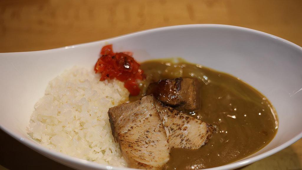  Chicken Paitan Curry Over Rice · Our house made Japaynese curry with our original Chicken Paitan soup over a pile of rice. Loaded with potatoes, carrots, onions with Kakuni & sliced Char Siu.