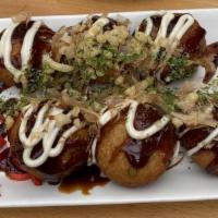 Takoyaki  · One of the most popular Japanese snack. It is filled with diced octopus and some vegetables....