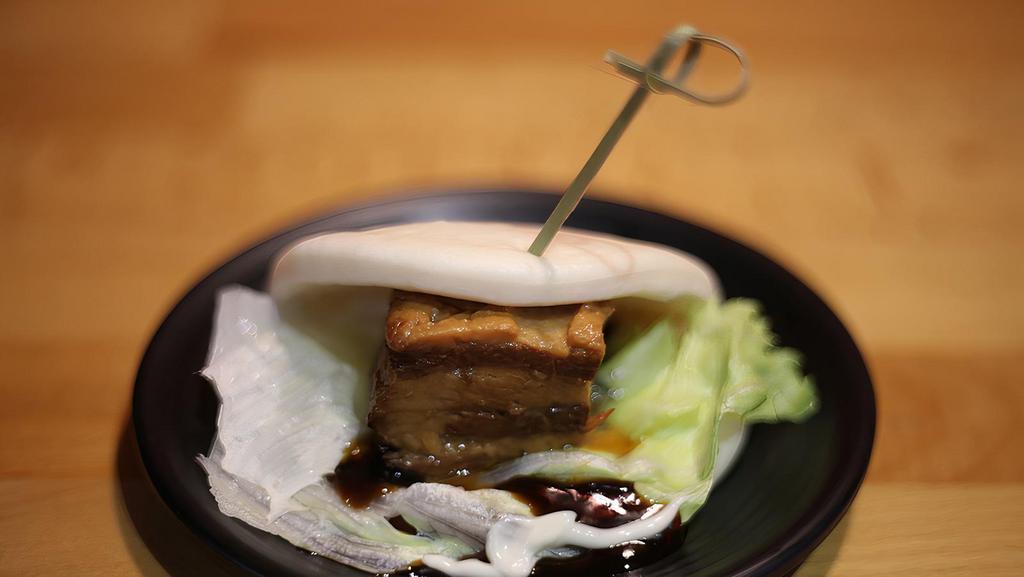 Kakuni Char Siu Pork Bun · Steamed soft bun with simmered tender Kakuni Pork Char Siu. Come with lettuce,teriyaki sauce & Japanese Mayo