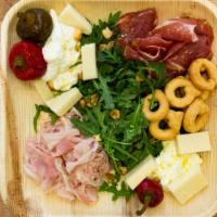 Charcuterie Board · Assorted meats, cheeses and spreads served with our homemade focaccia.