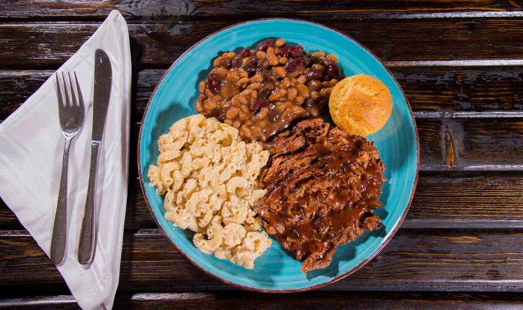 Pulled Pork Plate · Your choice of two sides with a cornbread muffin.