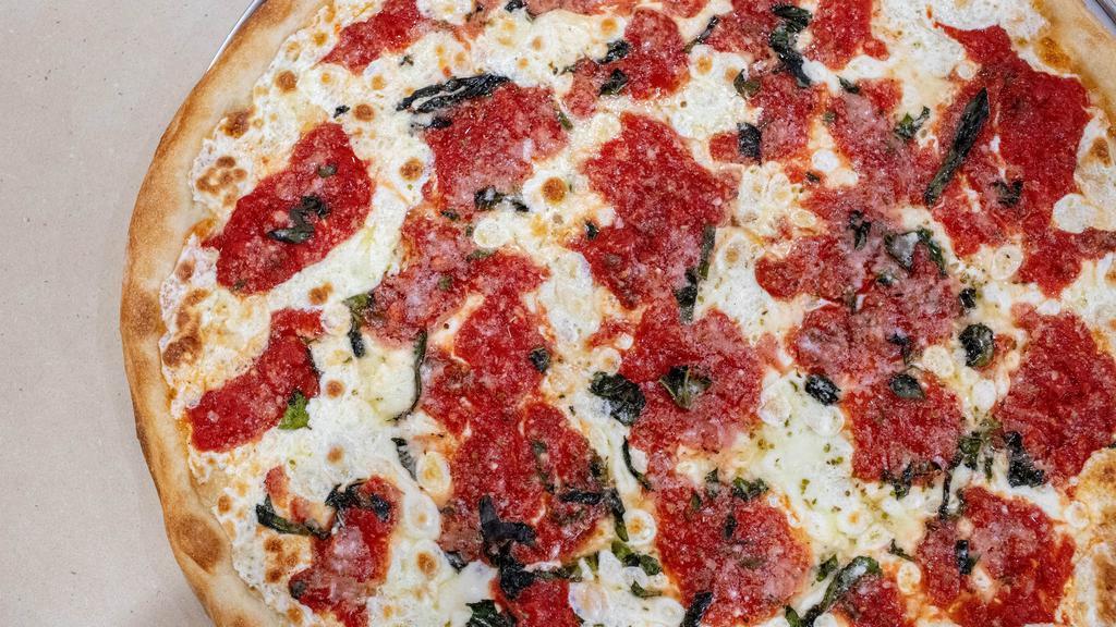 Margarita Pizza Slice · Fresh mozzarella cheese, fresh basil, and homemade tomato sauce.