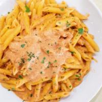 Penne Ala Vodka Catering · Pasta in vodka sauce. Supersized for your party.