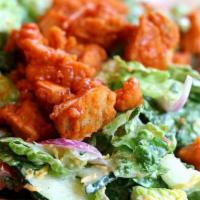 Buffalo Salad · Romaine, red peppers, red onions, buffalo chicken salad, crumbled bleu cheese & ranch dressi...