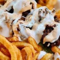 Norcal Asada Fries · Sometimes, it’s good to be bad. Take for example hella crisp, delicious french fries, drizzl...