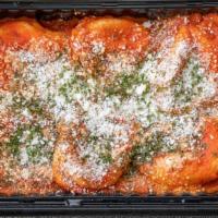 Cheese Ravioli · Cheese ravioli in our homemade marinara sauce and grated cheese.