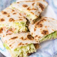 Regular Chicken Quesadilla · Made with Monterey jack cheese melted between two fresh flour tortillas. Served with lettuce...