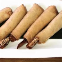 Shrimp Spring Rolls (5 Pieces) · marinated shrimp stuffed in grounded chicken and shrimp meat, coriander root,
individually w...